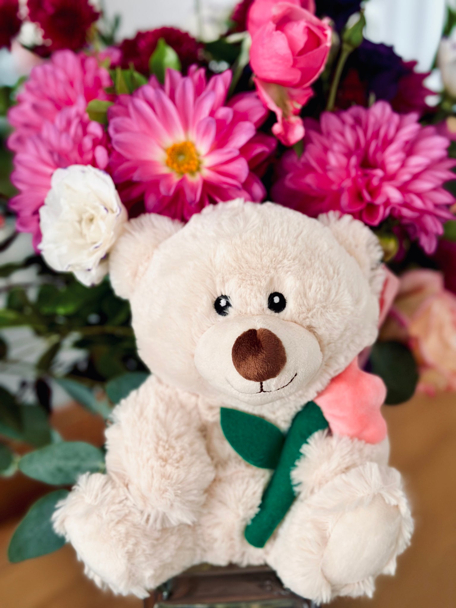 Plush teddy with tulip