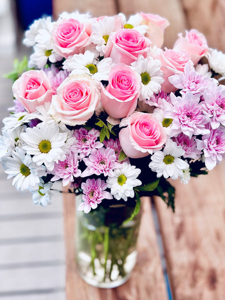 Pink roses with pink and white chrysanthemums stylish bouquet