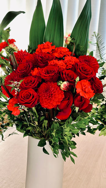 Red roses carnations and dahlias