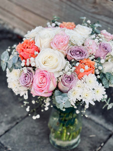 Pastel bridal and bridesmaids bouquets