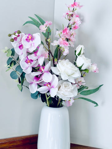 Pink tones and white orchid cherry blossom and rose vase