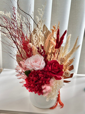 Vibrant red and pink dry vase arrangement