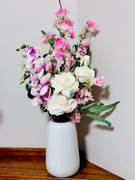 Pink tones and white orchid cherry blossom and rose vase