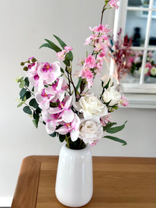 Pink tones and white orchid cherry blossom and rose vase