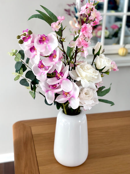 Pink tones and white orchid cherry blossom and rose vase