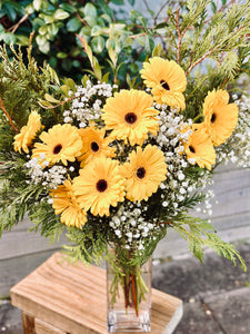 Yellow and white Gerbera and baby’s breath