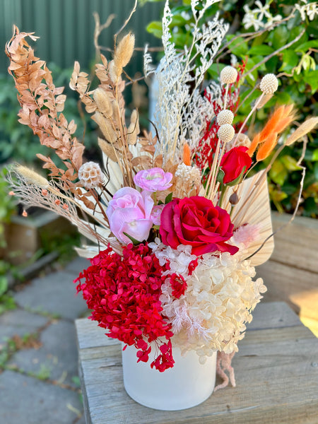 Vibrant red and pink dry vase arrangement