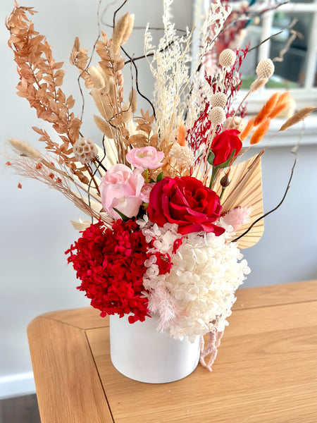 Vibrant red and pink dry vase arrangement