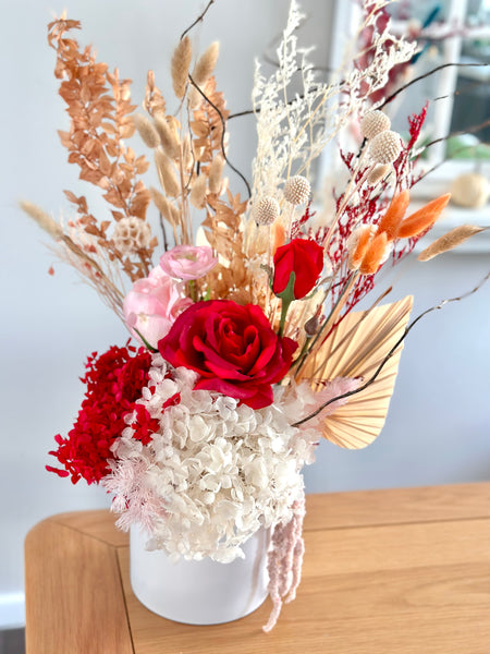 Vibrant red and pink dry vase arrangement