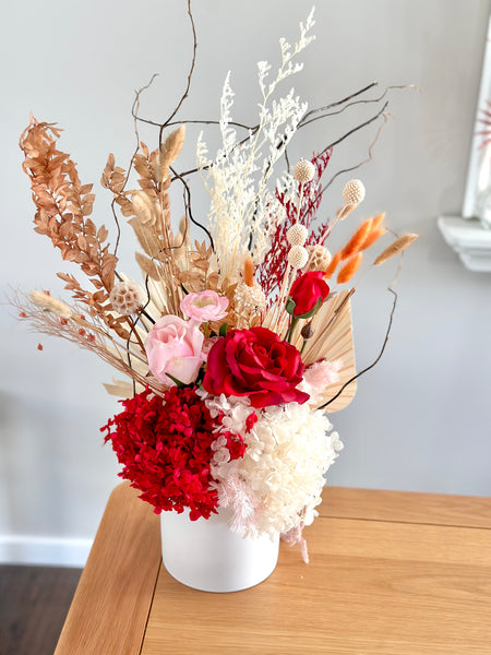 Vibrant red and pink dry vase arrangement