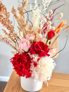 Vibrant red and pink dry vase arrangement