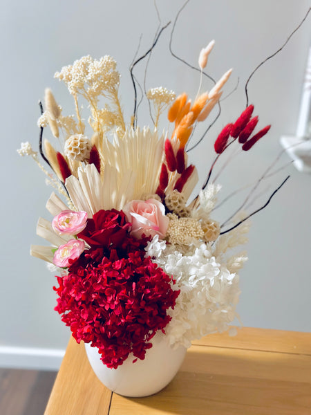 Vibrant red pink and white dry vase arrangement