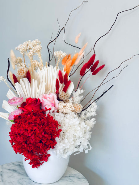 Vibrant red pink and white dry vase arrangement
