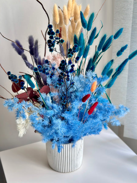Vibrant blue tones dry flower vase