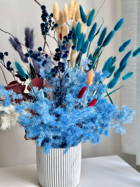Vibrant blue tones dry flower vase