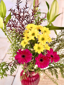 Beautiful pink Gerbera and yellow chrysanthemums