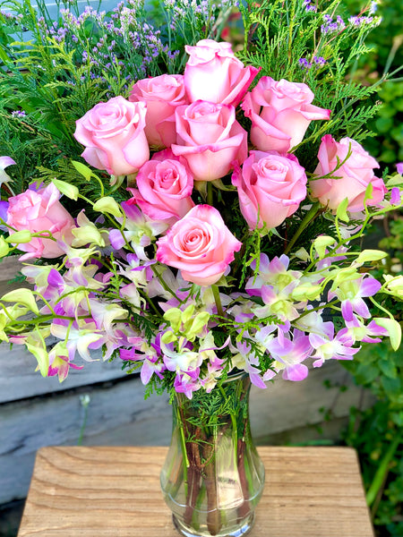 Pink rose and orchid bouquet