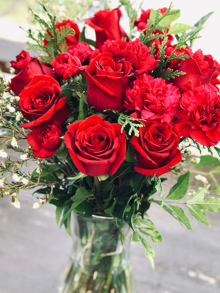 Lovely red roses and carnation bouquet