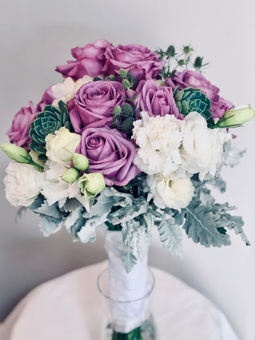 Elegant purple rose bridal bouquet