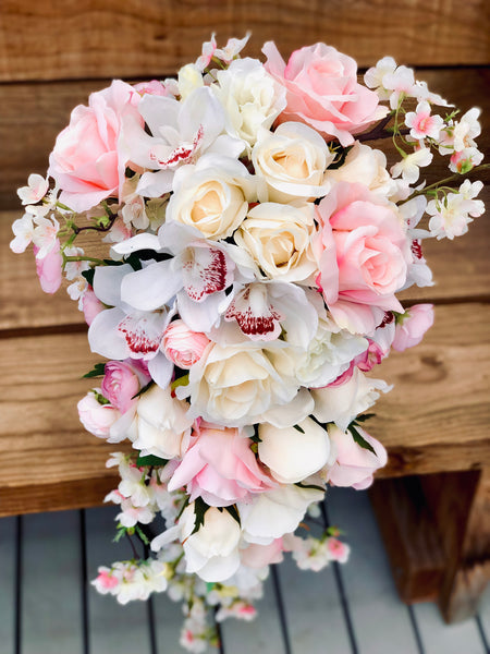 Silk rose, orchid and cherry blossom trailing bridal bouquet