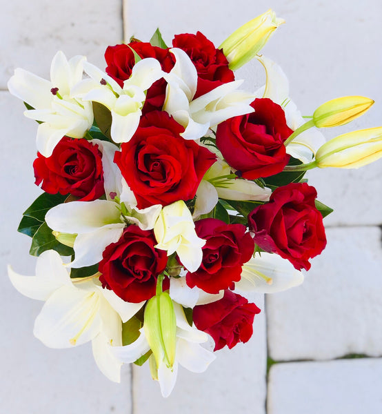 Red rose and white lily bouquet