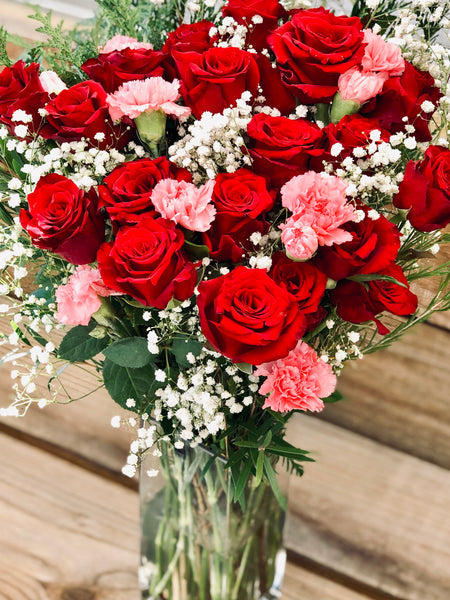 Roses, carnations and baby’s breath bouquet