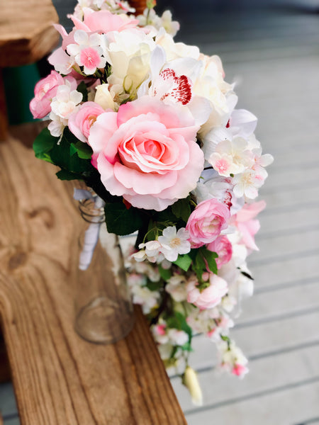 Silk rose, orchid and cherry blossom trailing bridal bouquet