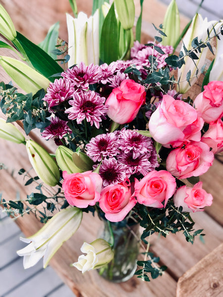 Pink and purple florist choice arrangement