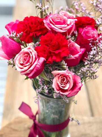 Cherry pink rose and red carnations bouquet