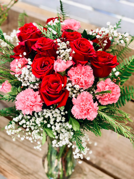 Roses, carnations and baby’s breath bouquet