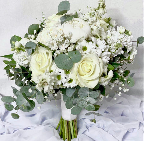Elegant white rose and gum leaf bridal bouquet