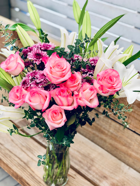 Pink and purple florist choice arrangement