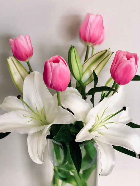 Pink tulips and white lily bouquet