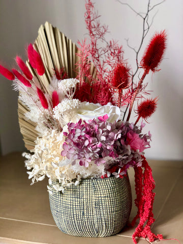 Red and rustic tones dry vase arrangement