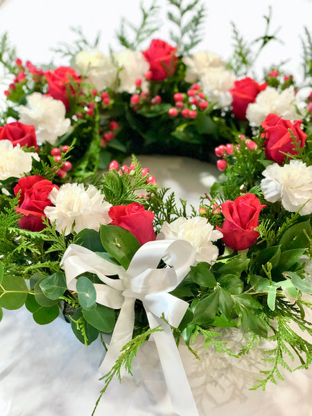 Red rose and white carnation sympathy wreath