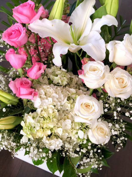 Deluxe pink and white gift box of flowers