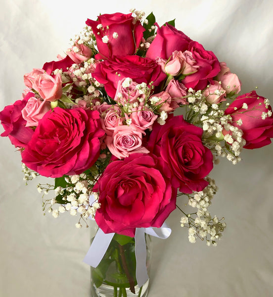 Deluxe pink long stem rose arrangement