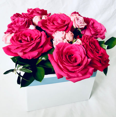 Box of pink roses