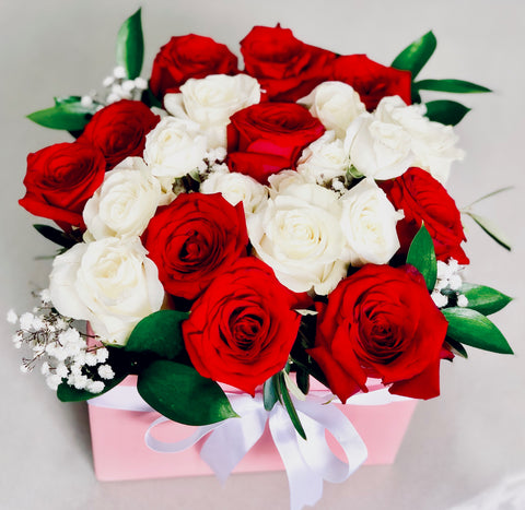 Box of red and white roses