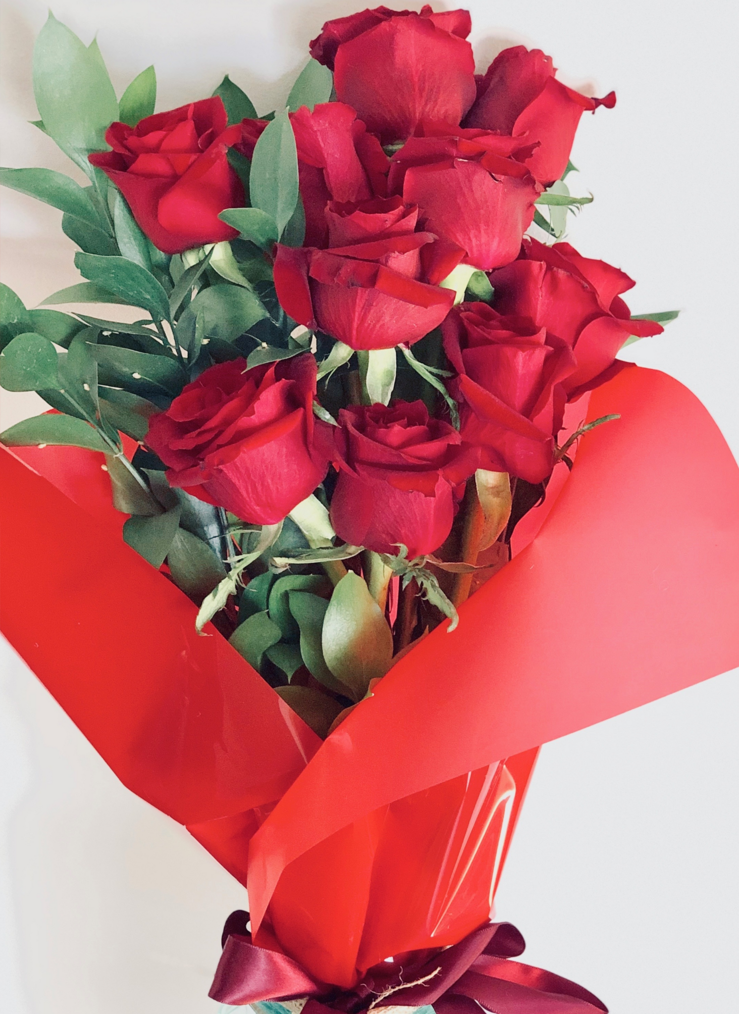 Red wrapped roses