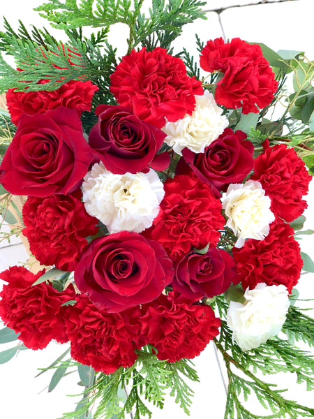 Romantic red and white roses and carnations